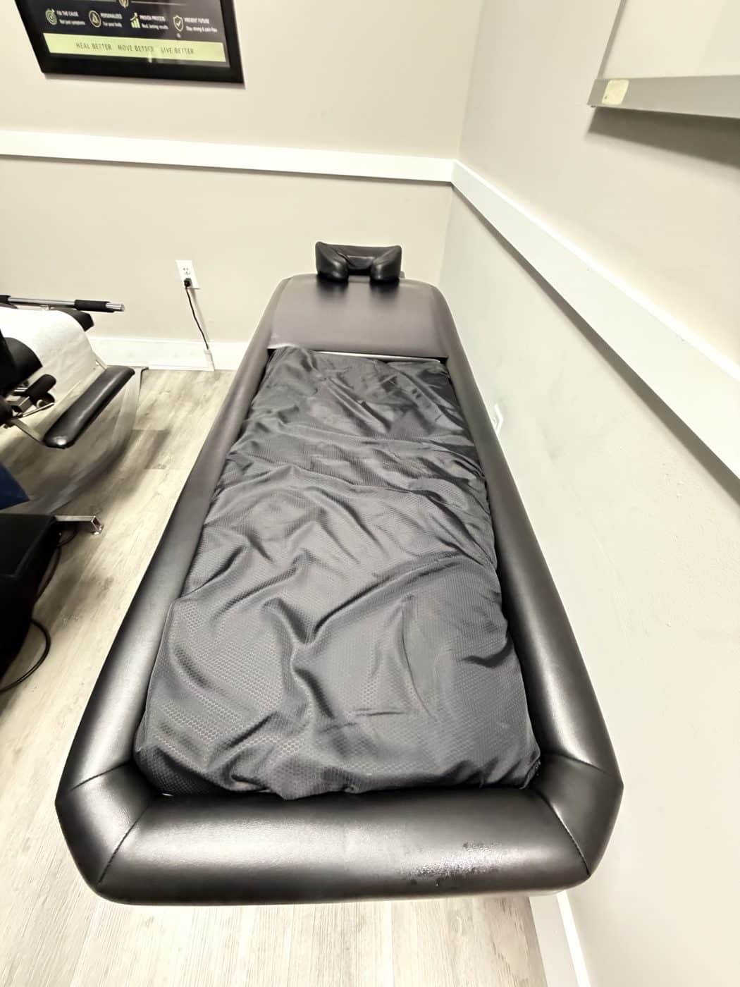 Parkland, FL Chiropractor | Dr. Jared Cohen | Coral Springs Chiropractor 7 Spinal decompression therapy table at The Spine and Wellness Center, Coral Springs FL